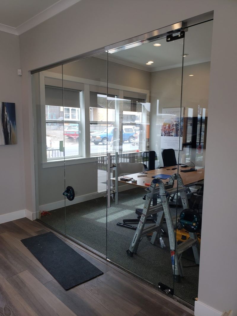 A glass office front onto a meeting room during fit out