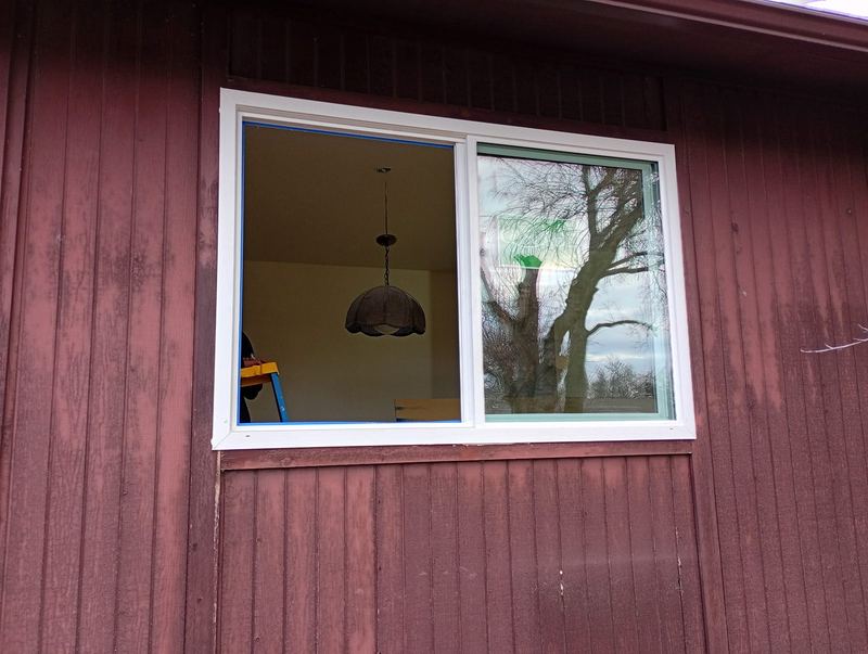 A replacement window installed into the side of a home